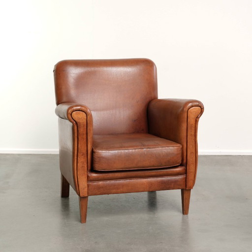 Robuster Vintage Schafsleder Sessel in schöner Cognacfarbe mit bequemem Sitz