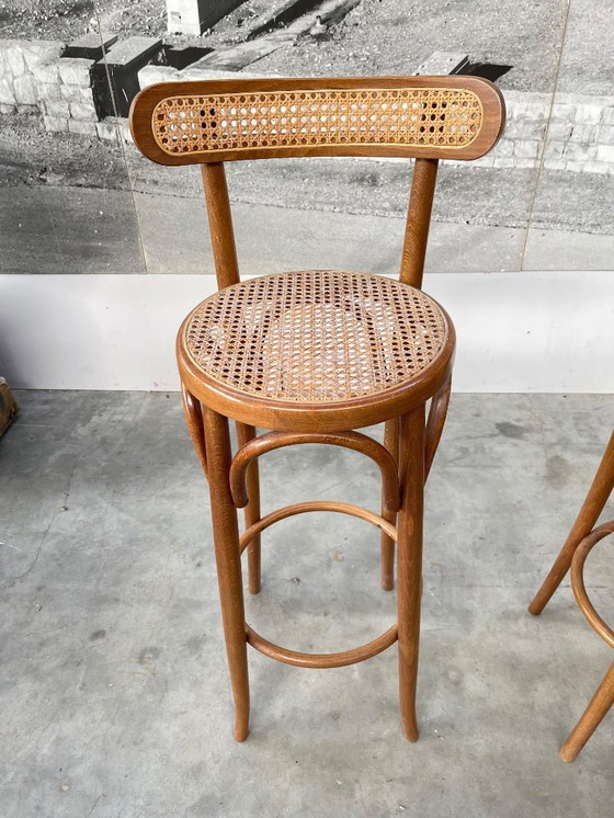 Image 1 of Ensemble vintage de 4 tabourets de bar en osier