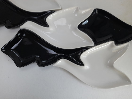 Image 1 of Bird and fish dishes according to Escher