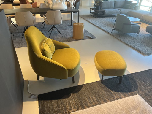 Sillón y puf Leolux