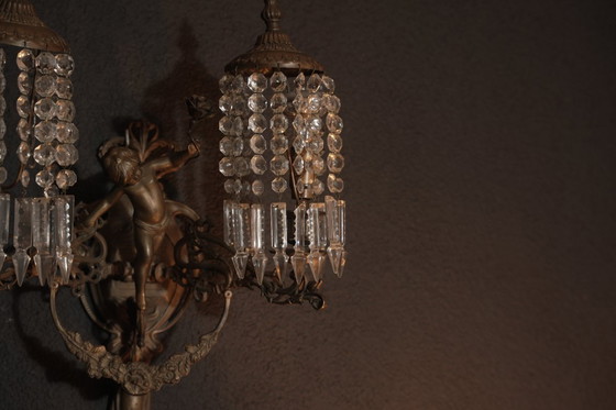 Image 1 of Bronze-colored Angel wall lamp