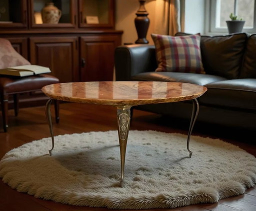 Mesa de centro ovalada con tablero efecto mármol