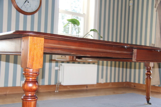 Image 1 of Victorian mahogany folding dining table by Eichholtz