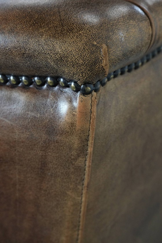 Image 1 of Comfortable vintage sheepskin wing chair with character