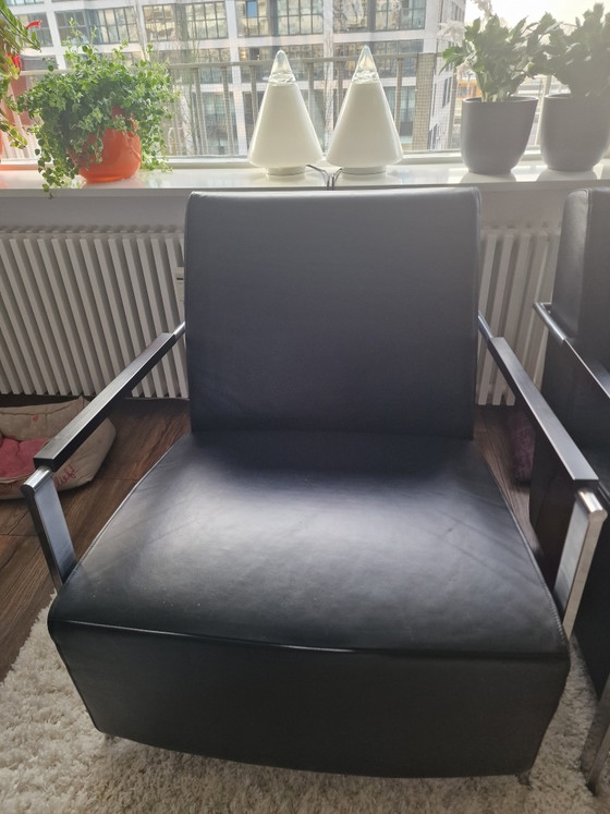 Image 1 of Twee design zwarte leren fauteuils.
Merk Harvink, Tpy Alowa.