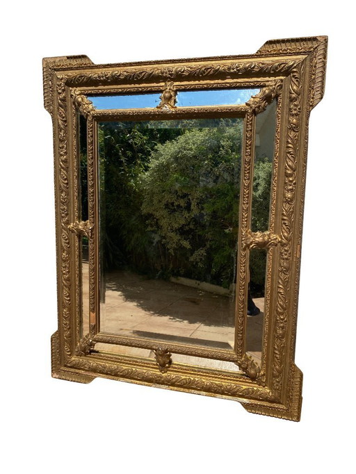 Louis XVI style gilded wood mantel mirror with parecloses - 19th century