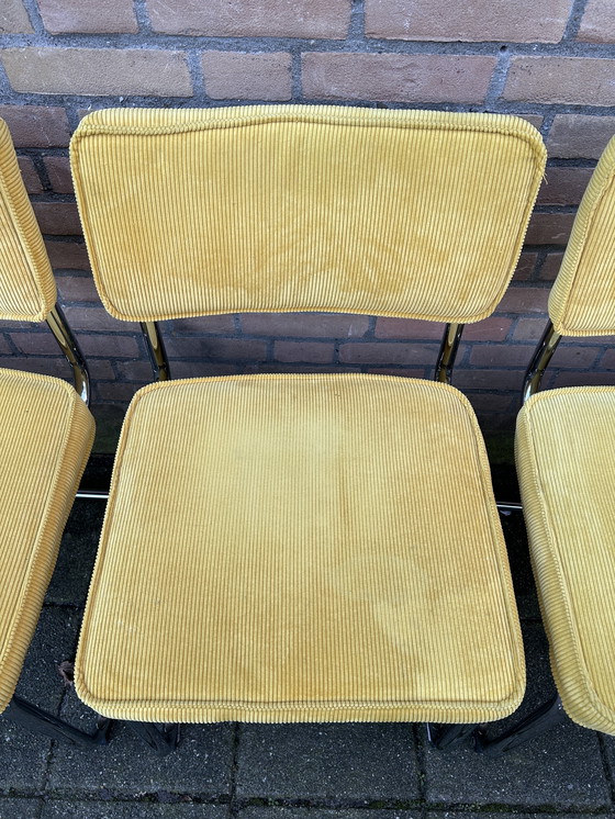Image 1 of 6 sedie in tessuto a coste gialle con struttura tubolare cromata
