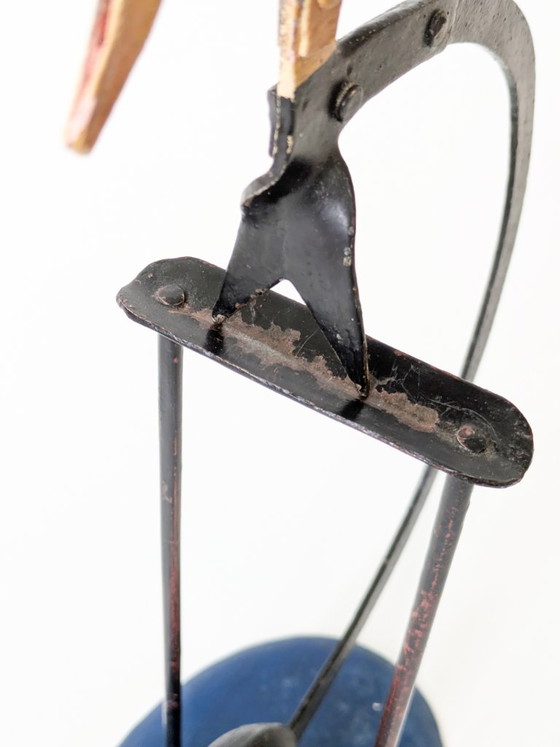 Scultura cinetica vintage a forma di volto di sole, in metallo dipinto a mano. – Sculture (photo 15 of 18)