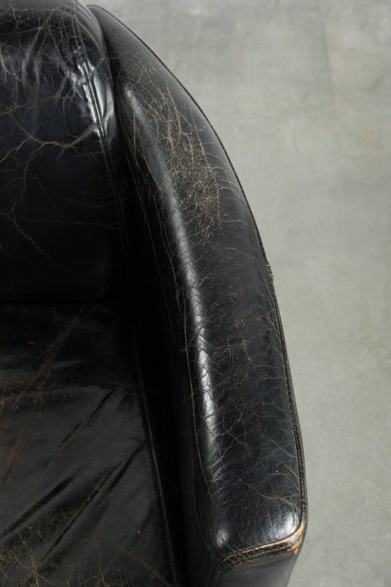 Image 1 of 2x rugged black vintage cowhide Aviator design armchairs with a distinctive look