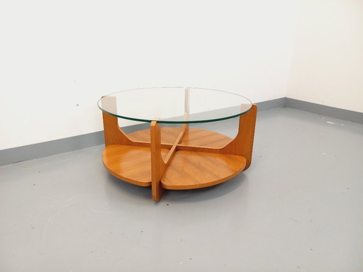 Vintage round coffee table with 2 tops by Hugues Poignant, in teak and glass from the 60s and 70s