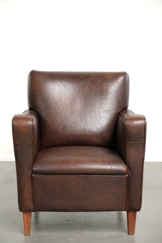 Fauteuil Subtil Foncé Vintage En Cuir De Mouton Avec Coussin Fixe Et Design Intemporel – Leather, Klassiek (photo 2 of 12)