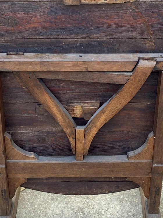 Image 1 of antique folding round winemaker's target table with tilting top