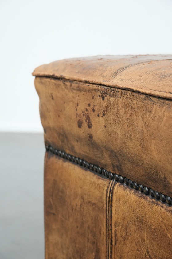 Image 1 of Sturdy square vintage sheepskin pouf/ottoman