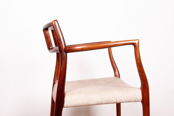 Image 1 of Fauteuil Danois en Palissandre et tissu, modèle 64 par Niels Otto Moller pour Moller’s Mobelfabrik 1960.