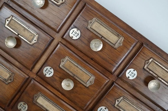 Image 1 of Vintage Duitse eiken apothekers- / spaarkast, jaren 1950