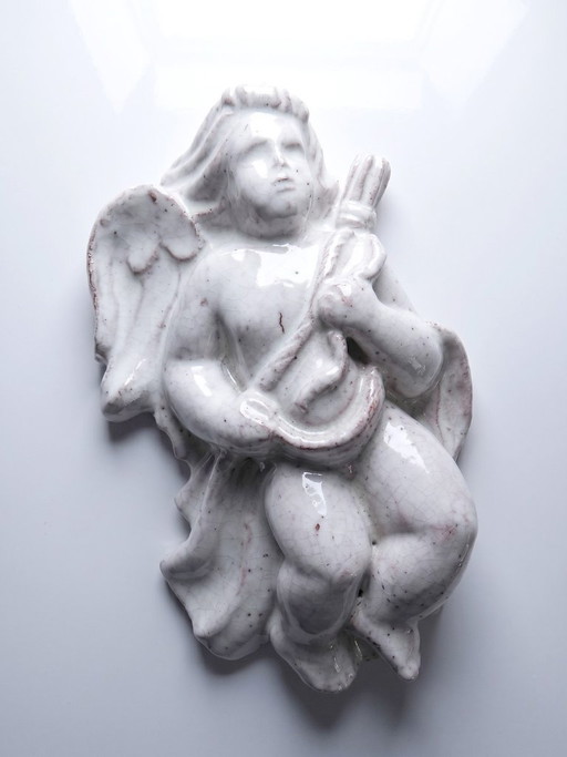 Ángel musical de pared en terracota vidriada, cerámica de Oostduinkerke, Bélgica.