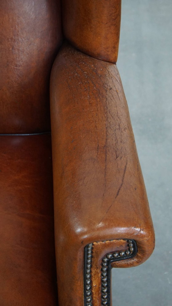 Image 1 of Grote vintage schapenleren oorfauteuil