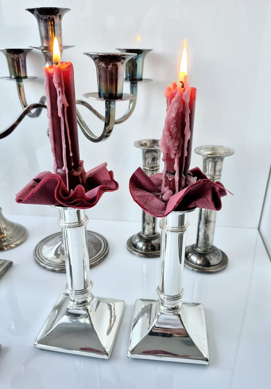 Image 1 of Collezione di 11 candelieri vintage placcati in argento (ottone) di varie epoche