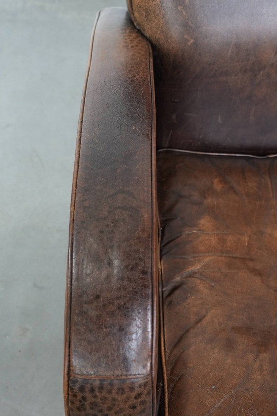 Image 1 of Vintage schapenleren armchair met een ronde vormgeving 