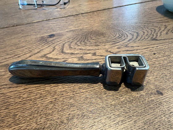 Image 1 of 1930/1940 silver rotary razor sharpener