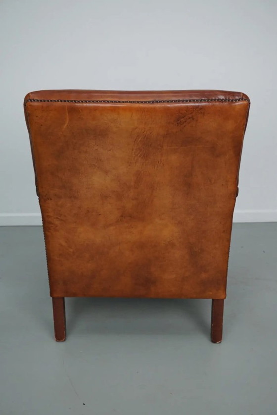 Image 1 of Vintage Nederlandse clubfauteuil van cognackleurig leer