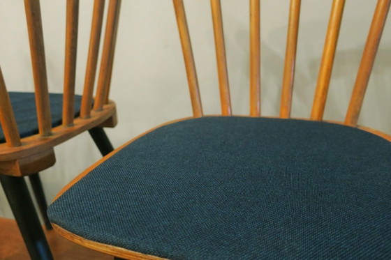 Set van 4 eetkamerstoelen in mid-century stijl met uitlopende poten en marineblauwe zittingen. – Textile (photo 11 of 11)