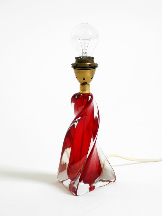 Image 1 of Beautiful heavy mid-century modern table lamp made of solid crystal glass in red and transparent