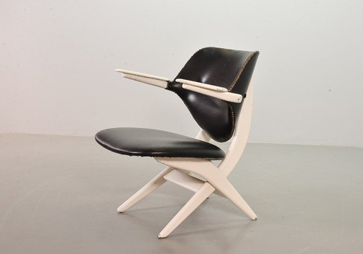 Louis van Teeffelen Dutch Design Pelican Arm Chair for Webe in Solid White Painted Teakwood and Black Leatherette. 