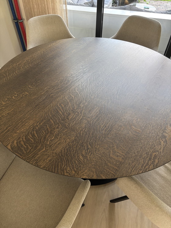 Image 1 of Round solid oak table with veneer top. Bought at Maison Manon.
