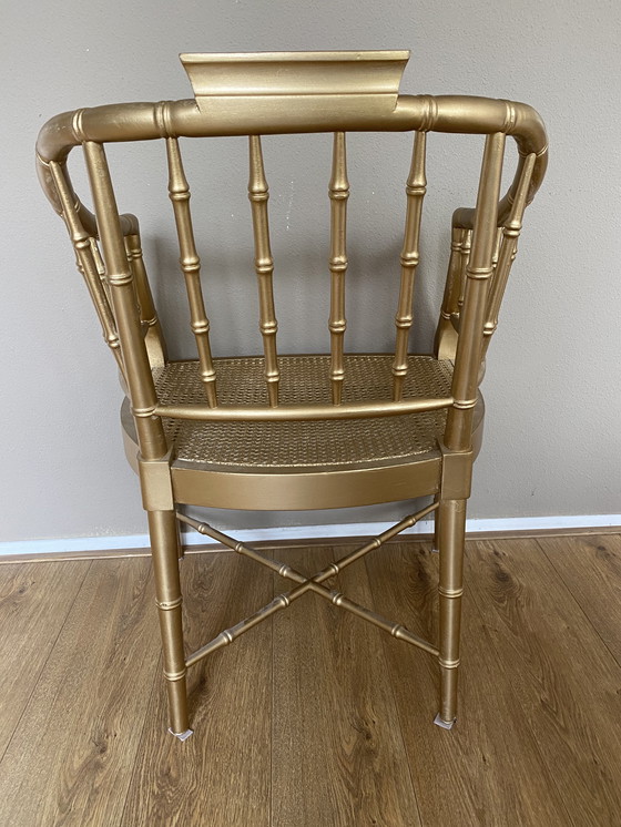 Image 1 of 4 vintage faux bamboo Regency Baker stoelen webbing