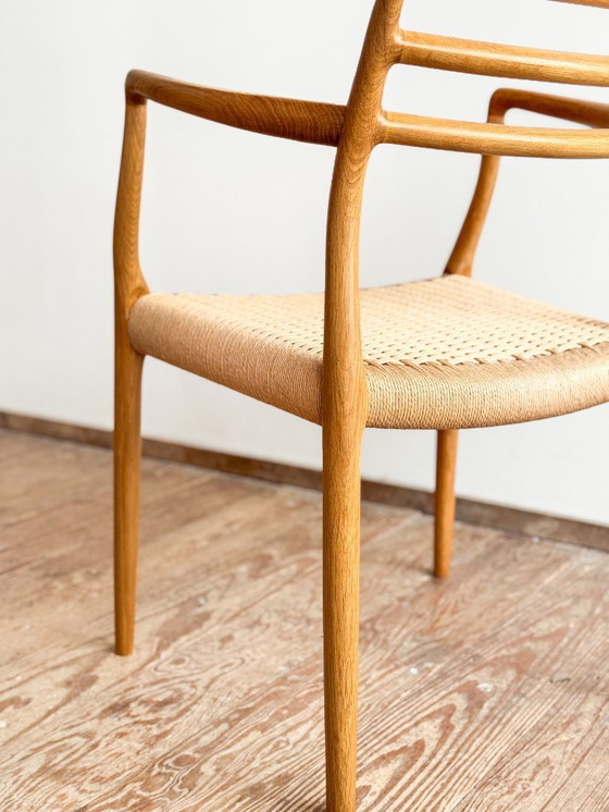 Image 1 of Esszimmerstuhl mit Armlehnen aus Eichenholz, Modell 62 für J.L. Moller