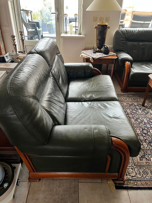 2x 2 seater sofa and 1× armchair dark green leather