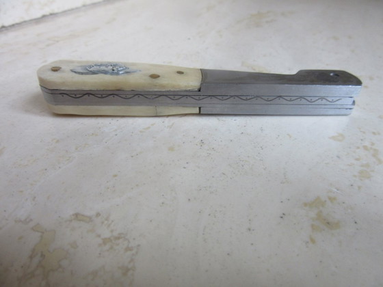Image 1 of Vendetta Korsisches Taschenmesser, Klappmesser aus A20-Stahl und Knochen, mit Mohrenkopf- und Wildschweinmotiven, Vintage