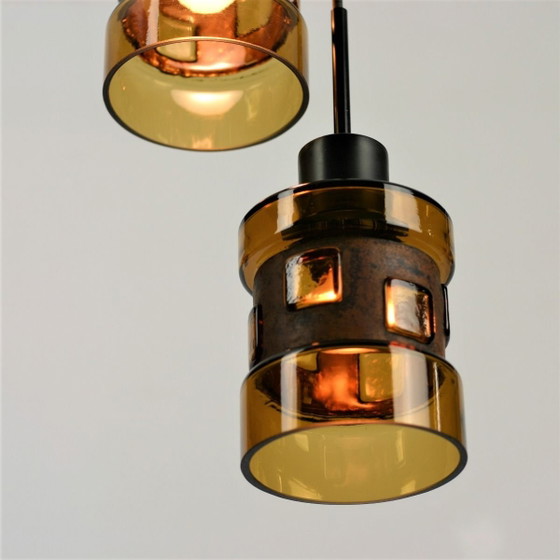Image 1 of Nanny Still for RAAK Amsterdam | Set of 3 Amber Glass Pendant Lamps | 1960s