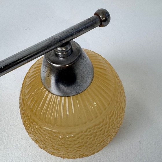 Image 1 of PAAR VINTAGE AMBERKLEURIGE WANDLAMPEN