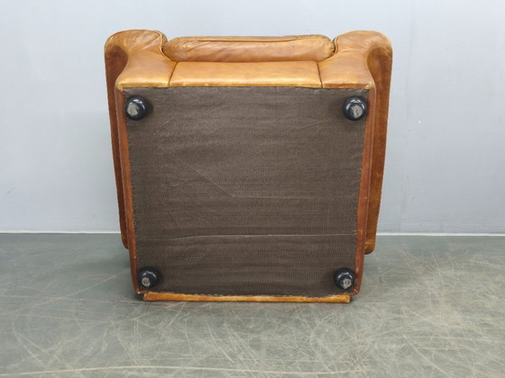 Image 1 of Een paar Arcon Italia loungefauteuils van cognacbruin buffelleer.