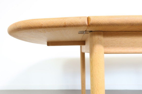 Image 1 of Getama eiken drop-leaf salontafel ,model nr GE 82/85 , ontworpen door Hans Wegner