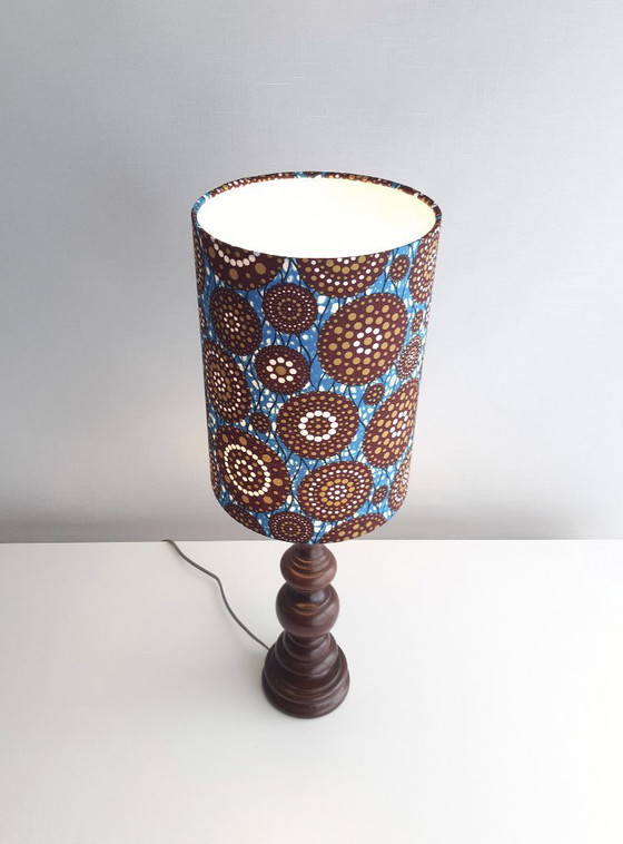 Image 1 of Turned wooden vintage lamp base with handmade lampshade of African wax fabric