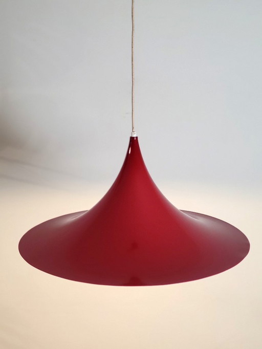 Set of 2 vintage XL semi- or trumpet pendant lamps in deep red