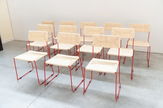 Image 1 of Design italiano scultoreo e sorprendente: sedie da pranzo in ferro rosso acceso e paglia naturale