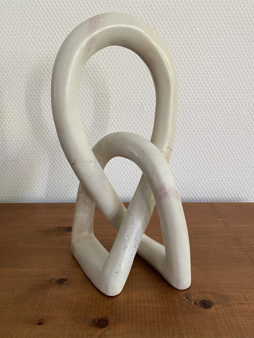 Statua dell'infinito in marmo H 45 L 15 P 14 cm