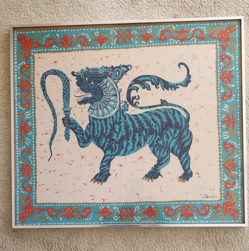 Two framed batik animal depictions