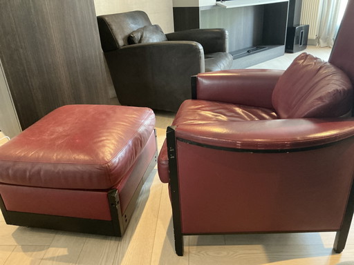 Giorgetti dark red leather chair with footstool