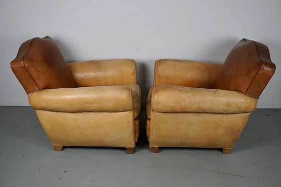 Image 1 of Coppia di poltrone da club francesi in pelle color cognac con schienali a baffo, anni '40