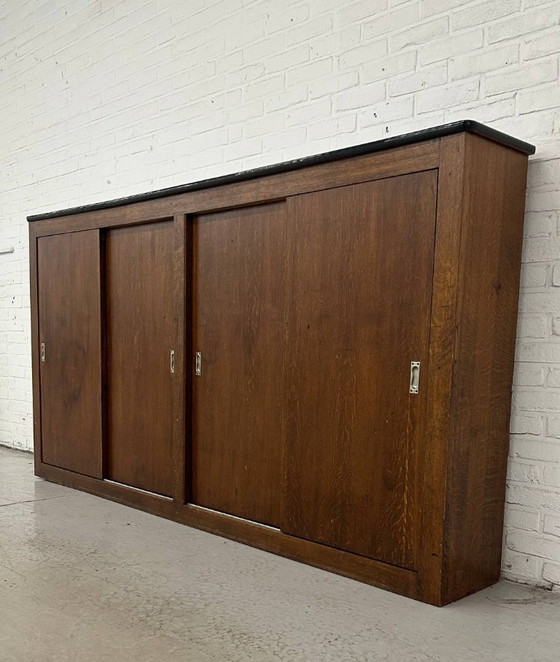 Image 1 of Vintage schoolkast - schuifdeurkast