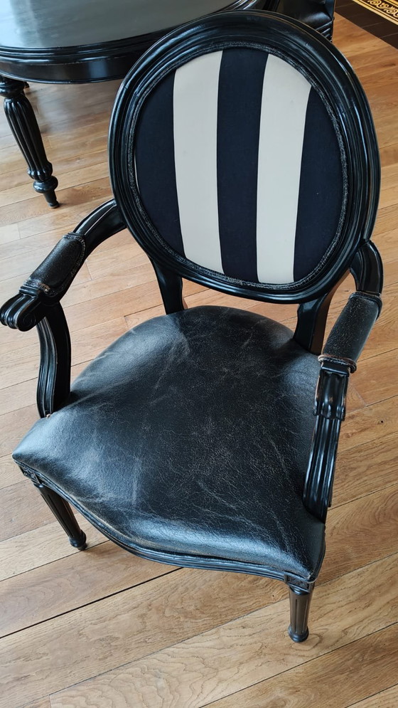 Image 1 of Table de salle à manger ovale noire avec 6 chaises