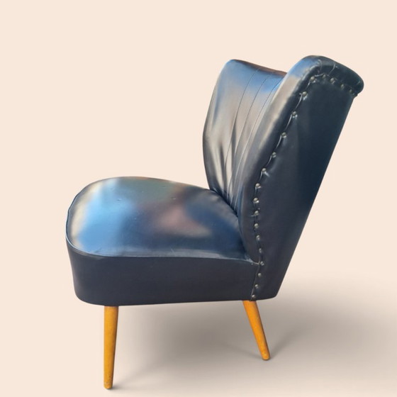 Vintage armchair black faux leather with wooden legs, Plastic (photo 3 of 6)