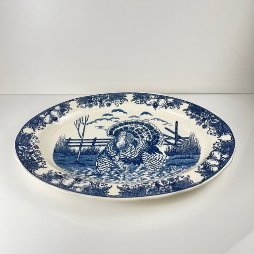 Large vintage oval blue earthenware dish with turkey decor