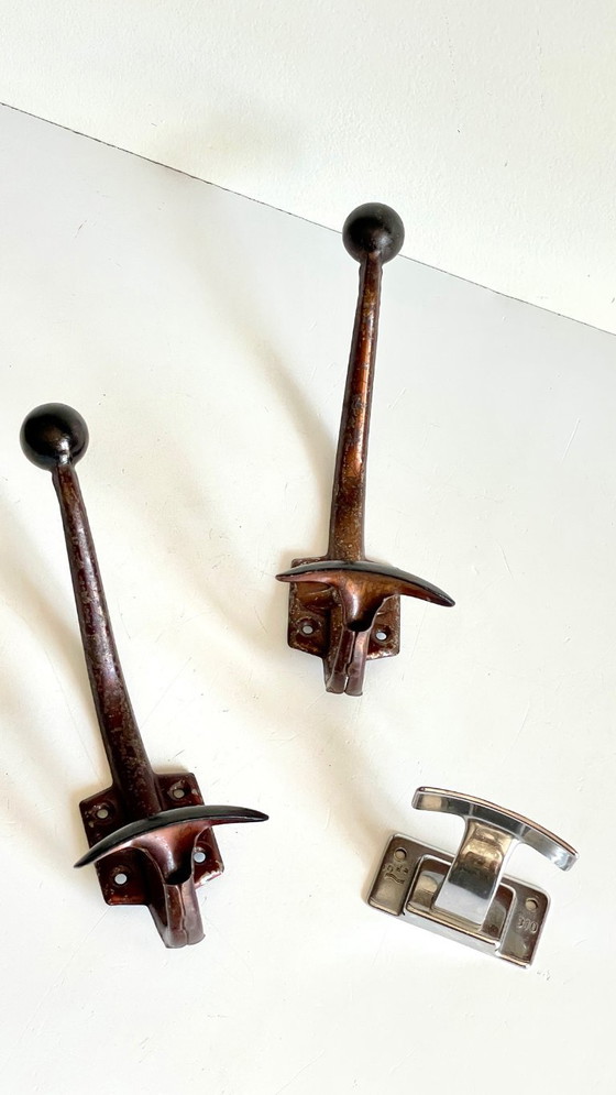 Image 1 of Vintage Patinated Metal Coat Hooks