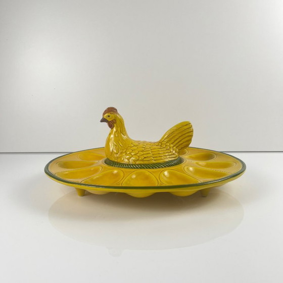 Image 1 of Yellow ceramic egg plate/display stand with hen, 20th century.